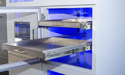 Extended drawer of a dry storage machine.
