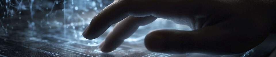 Person typing on a futuristic glowing ai-generated computer.