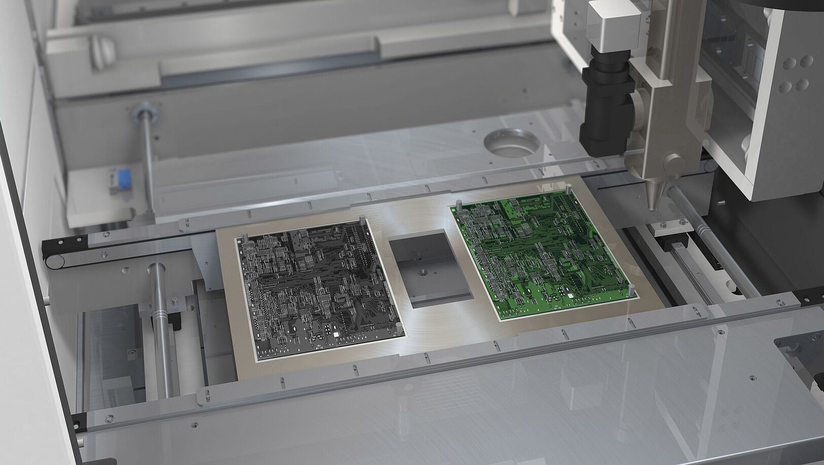 Laser machine with a tray carrier, two inserted circuit boards.
