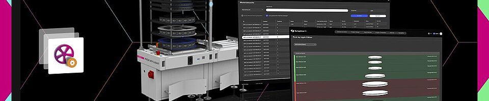 Operating a machine next to two screens.