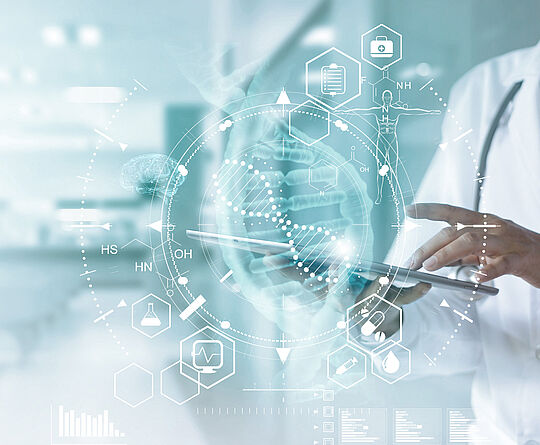 Woman in a doctor's coat taps her fingers on a touchpad, DNA strand and other health topics appear as holograms in front of her.