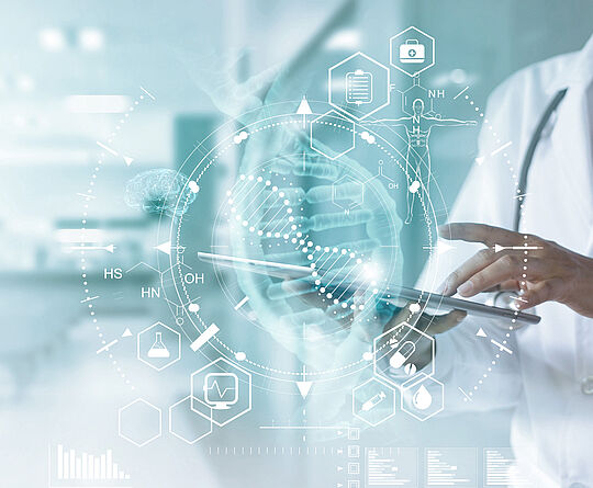 Woman in a doctor's coat taps her fingers on a touchpad, DNA strand and other health topics appear as holograms in front of her.