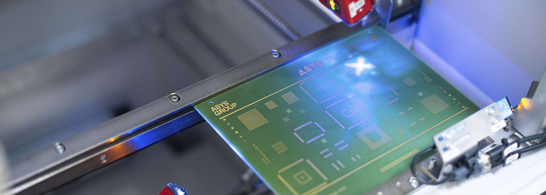 Interior view of a laser scanning machine, laser on a printed circuit board.