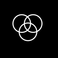 White pictogram of three overlapping circles on black background.