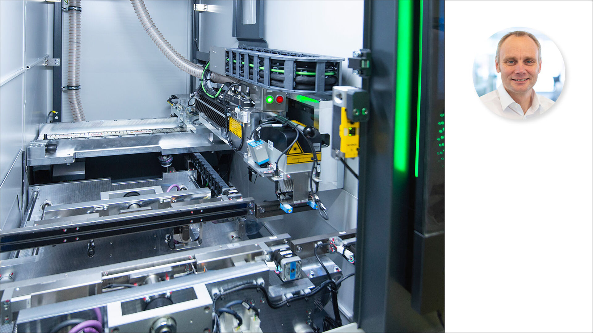 Interior view of a laser marking machine with a photo of a person next to it
