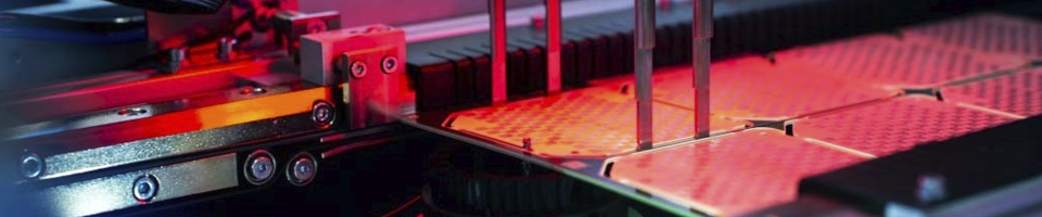 Interior view of an depaneling machine with red light.