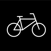 White pictogram of a bicycle in side view on black background.