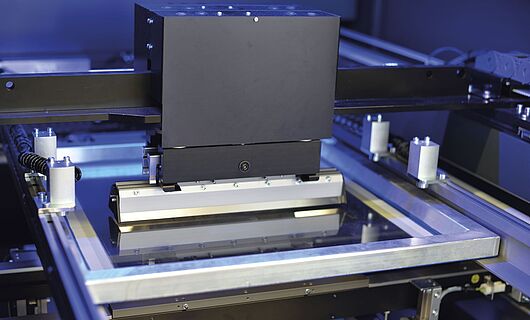 Interior view of a printing press. Squeegee.