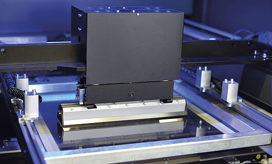 Interior view of a printing press. Squeegee.