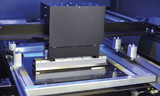 Interior view of a printing press. Squeegee.