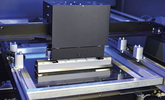 Interior view of a printing press. Squeegee.