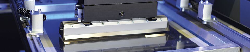 Interior view of a printing press. Squeegee.