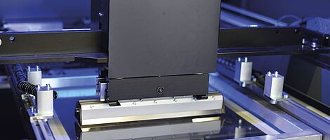 Interior view of a printing press. Squeegee.