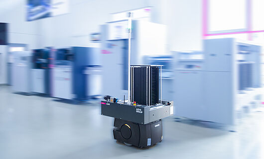 AMR in a demo room in front of a machine line.