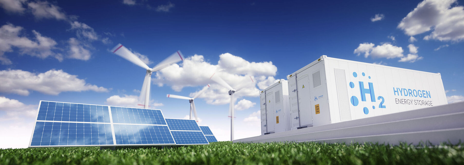 Solar panels, wind turbines, and hydrogen energy storage under blue skies